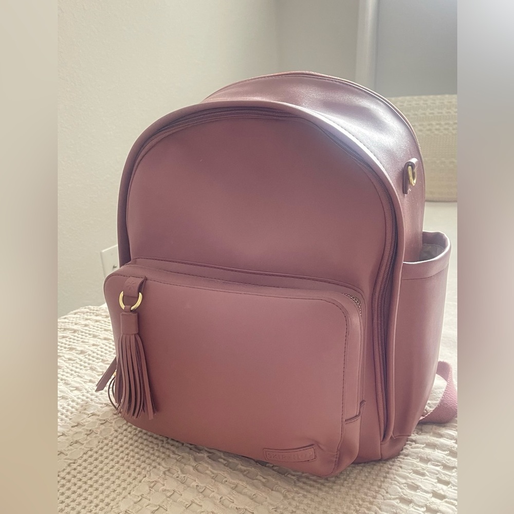 SKIP HOP diaper bag back pack and portable baby changing pad